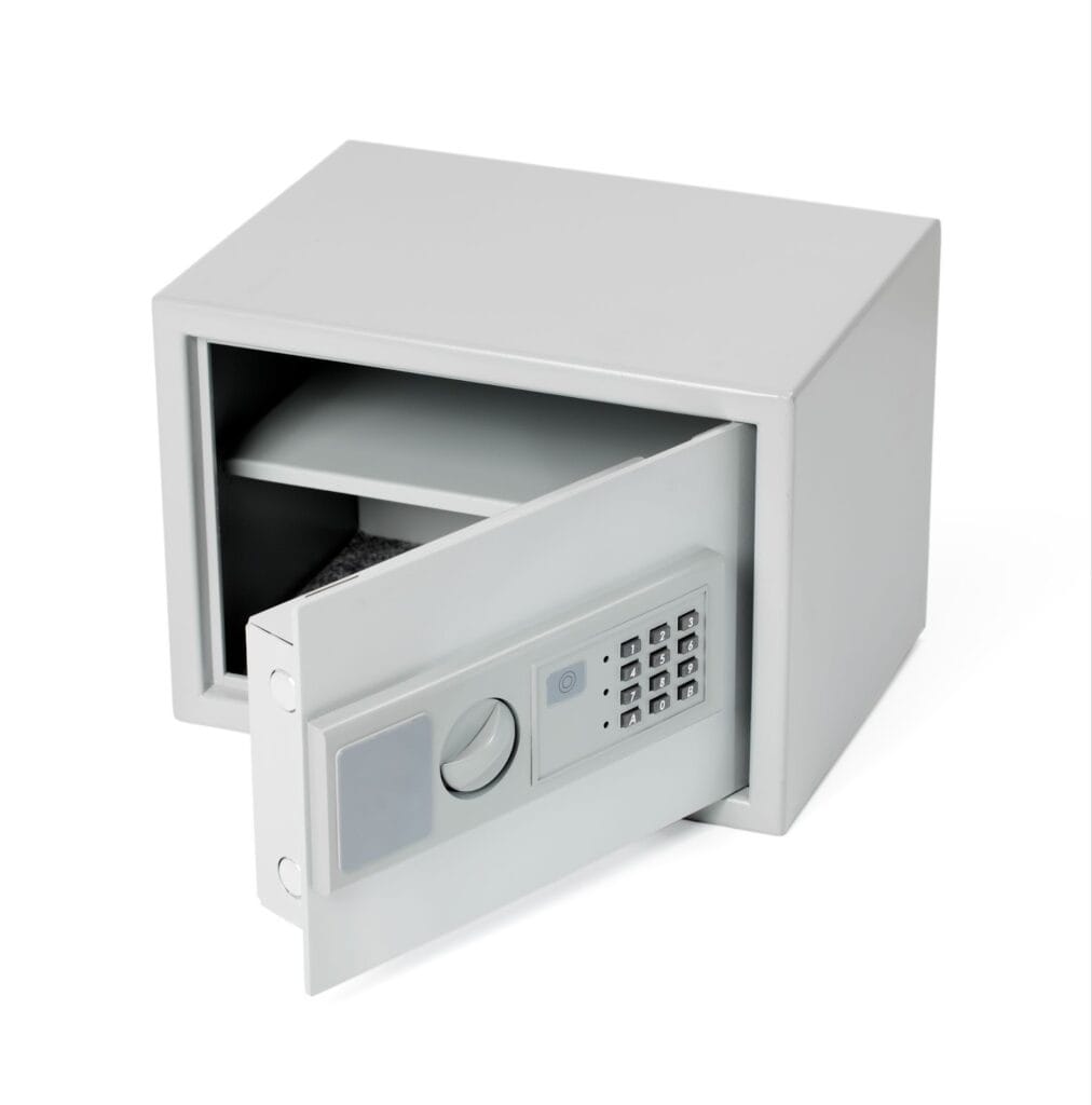 Open electronic keypad safe with shelving inside.