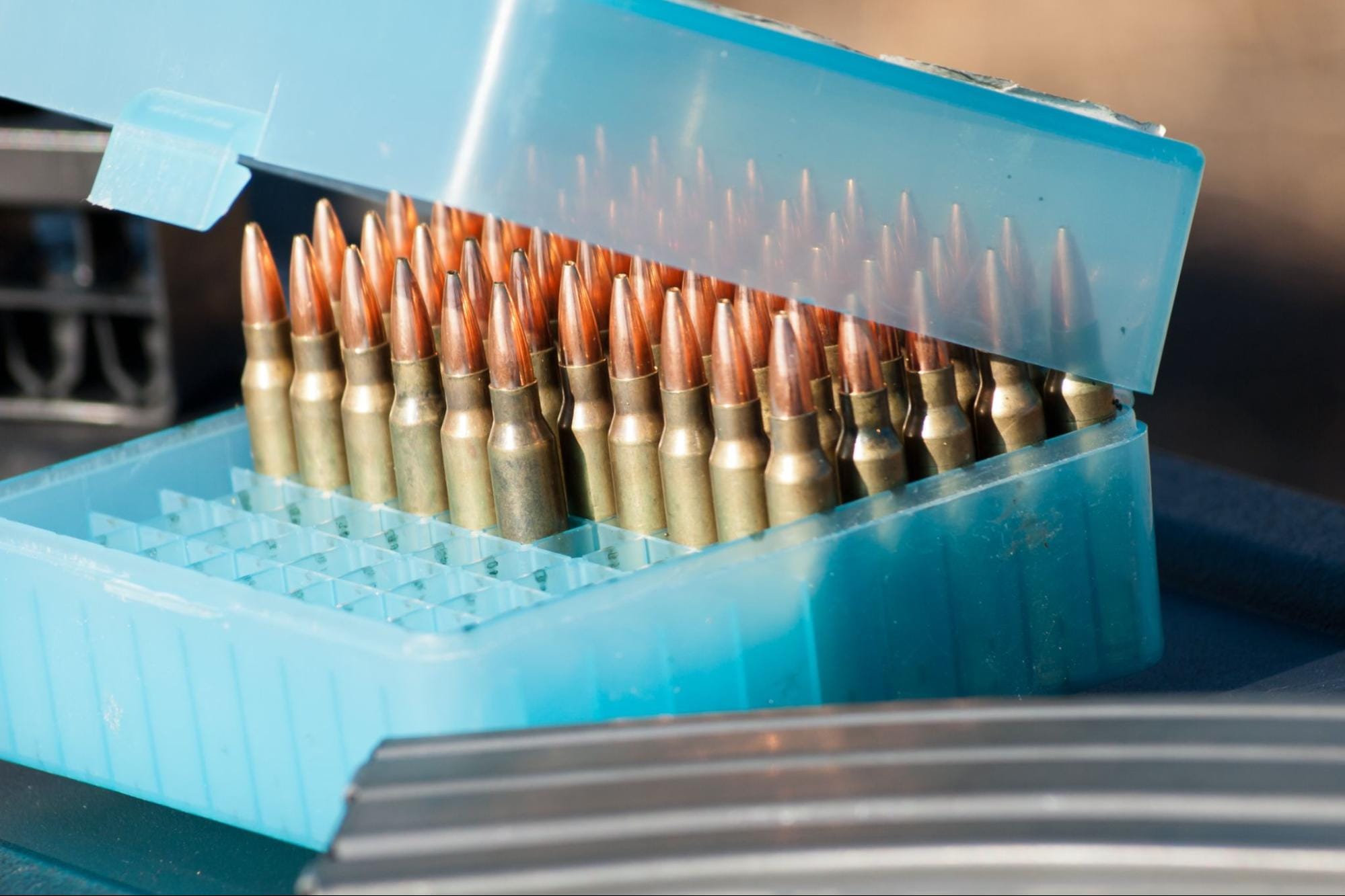 Bullets in blue plastic ammunition box